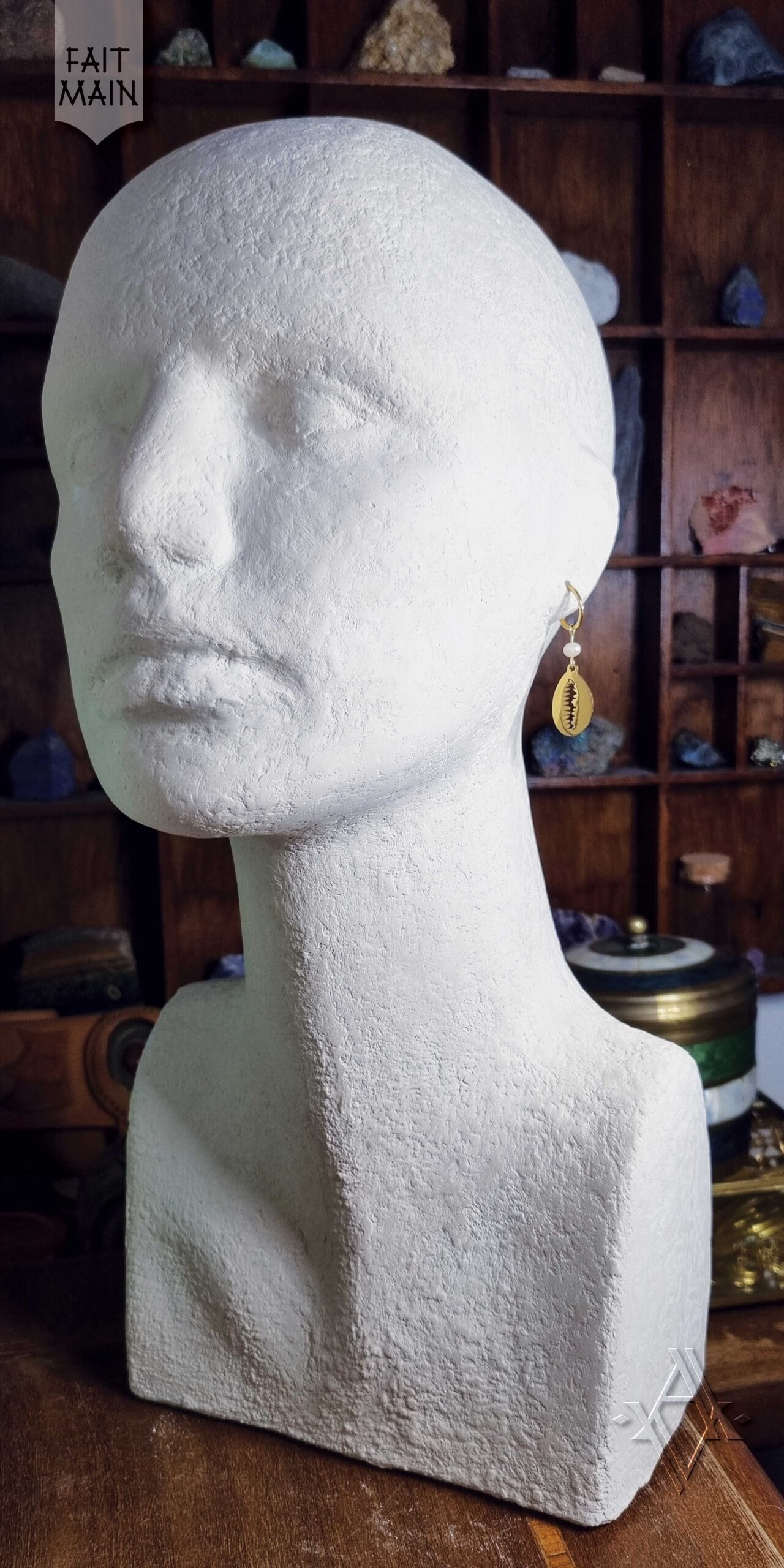 Boucles d'oreille Cauri portée