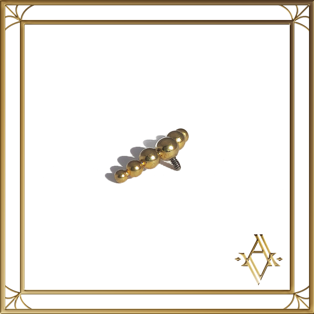 Piercing titane doré Menat Artefact de Vala